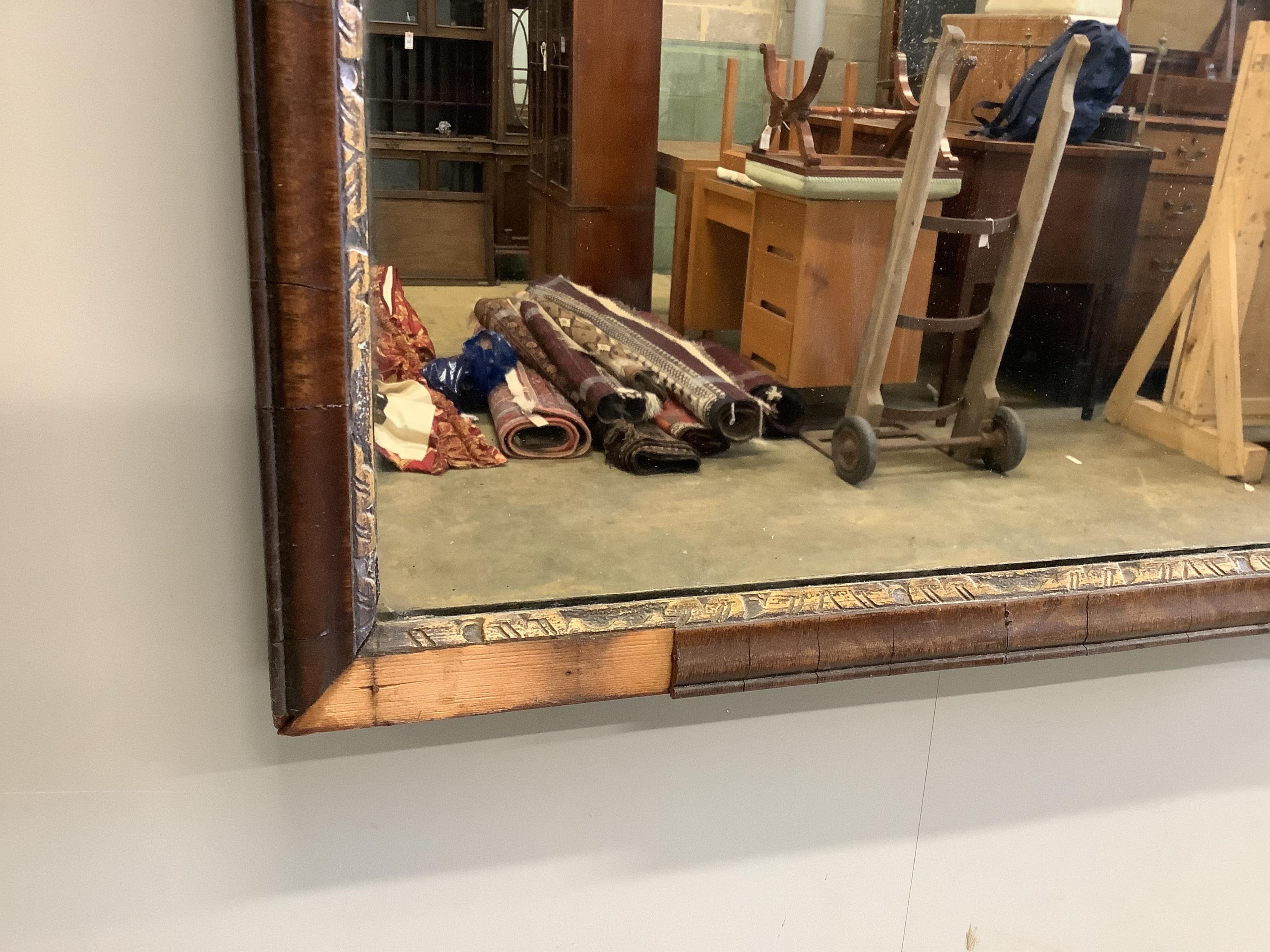 An 18th century style mahogany fret cut wall mirror, with painted decoration, width 51cm, height 124cm. Condition - poor